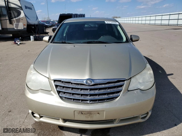 2010 Chrysler Sebring Limited with VIN 1C3CC5FD9AN162052, listed as a Copart auction lot 84756864 with 136,742 mi miles and Non Repairable. Bid and sale history available at carsss.com. Image 5.