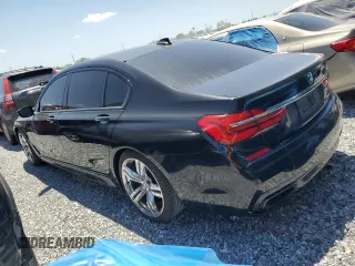 2016 BMW 7 Series 740i with VIN WBA7E2C52GG504096, listed as a Copart auction lot 49258935 with 111,267 mi miles and Salvage Title. Bid and sale history available at carsss.com. Image 2.
