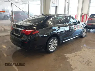 2015 Infiniti Q70 with VIN JN1BY1PR2FM830317, listed as a IAAI auction lot 41619546 with 85,964 mi miles and . Bid and sale history available at DreamBid. Image 4.