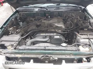 2000 Toyota Tacoma with VIN 5TEWN72N8YZ708960, listed as a IAAI auction lot 41820405 with 175,453 mi miles and . Bid and sale history available at DreamBid. Image 10.