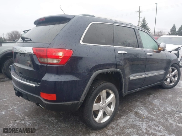 2012 Jeep Grand Cherokee Overland with VIN 1C4RJFCT9CC182216, listed as a IAAI auction lot 41490446 with 153,237 mi miles. Bid and sale history available at carsss.com. Image 4.