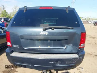 2007 Jeep Grand Cherokee Laredo with VIN 1J8GR48K77C582875, listed as a IAAI auction lot 42061653 with 259,767 mi miles. Bid and sale history available at carsss.com. Image 16.