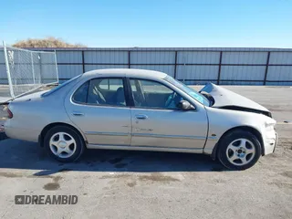 1997 Nissan Altima XE with VIN 1N4BU31D4VC221788, listed as a IAAI auction lot 41356945 with 136,931 mi miles. Bid and sale history available at carsss.com. Image 13.