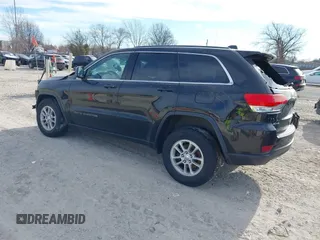 2018 Jeep Grand Cherokee Laredo E with VIN 1C4RJFAG7JC244103, listed as a IAAI auction lot 41260642 with 116,797 mi miles. Bid and sale history available at carsss.com. Image 3.
