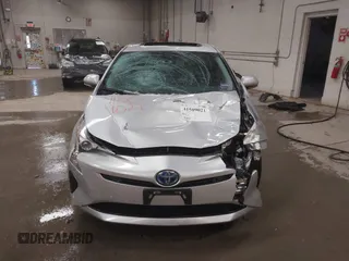2017 Toyota Prius Two z VIN JTDKARFU1H3037959, wystawiony jako IAAI lot #41509021 z przebiegiem 82 500 mil mil oraz . Historia ofert i sprzedaży dostępna na DreamBid. Obrazek 13.