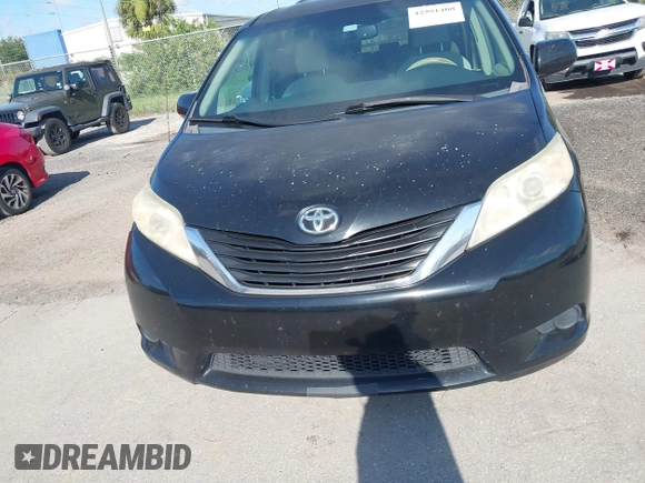 2011 Toyota Sienna LE AAS with VIN 5TDKK3DC4BS028084, listed as a IAAI auction lot 42591408 with 320,782 mi miles and . Bid and sale history available at DreamBid. Image 12.