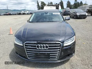 2015 Audi A8 4.0T z VIN WAU32AFD1FN012156, wystawiony jako Copart lot #52759185 z przebiegiem 117 498 mil mil oraz Szkody całkowita. Historia ofert i sprzedaży dostępna na DreamBid. Obrazek 5.