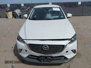 2018 Mazda CX-3 Touring z VIN JM1DKDC75J0326180, wystawiony jako IAAI lot #41787541 z przebiegiem 96 584 mil mil oraz . Historia ofert i sprzedaży dostępna na DreamBid. Obrazek 12.