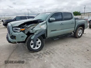 2023 Toyota Tacoma SR with VIN 3TMCZ5AN2PM580515, listed as a Copart auction lot 60422635 with 65,846 mi miles and Salvage title. Bid and sale history available at DreamBid. Image 1.