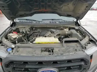 2023 Ford F-150 XL с VIN 1FTMF1E56PKF56063, выставлен на аукционе Copart как лот 46163445 с пробегом 23 891 миль миль и Списание • Salvage title. История ставок и продаж доступна на DreamBid. Изображение 14.