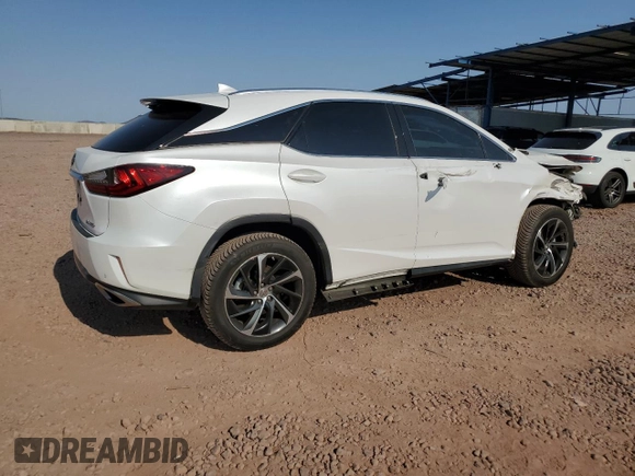 2016 Lexus RX 350 with VIN 2T2BZMCA5GC033906, listed as a Copart auction lot 64869445 with 129,861 mi miles and Salvage title. Bid and sale history available at DreamBid. Image 3.