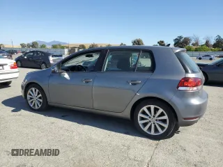 2014 Volkswagen Golf TDI w/Sunroof & Nav z VIN WVWNM7AJ2EW006137, wystawiony jako Copart lot #57031715 z przebiegiem 136 654 mil mil oraz Szkoda całkowita • Salvage title. Historia ofert i sprzedaży dostępna na DreamBid. Obrazek 2.