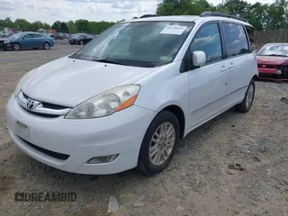 2007 Toyota Sienna XLE with VIN 5TDZK22C57S074123, listed as a IAAI auction lot 42128064 with 184,183 mi miles and . Bid and sale history available at DreamBid. Image 2.