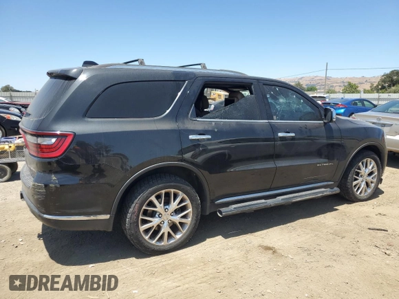 2014 Dodge Durango Citadel with VIN 1C4RDJEG5EC394396, listed as a Copart auction lot 61416305 with 185,730 mi miles and Salvage title. Bid and sale history available at DreamBid. Image 3.
