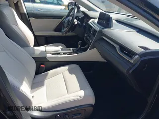 2021 Lexus RX with VIN 2T2AZMAA2MC196524, listed as a IAAI auction lot 42017362 with 80,922 mi miles. Bid and sale history available at carsss.com. Image 5.