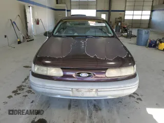 1992 Ford Taurus z VIN 1FACP50U4NA144506, wystawiony jako Copart lot #80000064 z przebiegiem 40 600 mil mil oraz Czysty tytuł • Clean title. Historia ofert i sprzedaży dostępna na DreamBid. Obrazek 5.