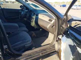 2011 Chevrolet Impala Police Police with VIN 2G1WD5EM6B1251953, listed as a IAAI auction lot 40972078 with 106,935 mi miles. Bid and sale history available at carsss.com. Image 5.