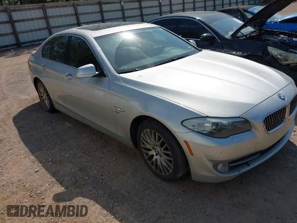 2011 BMW 5 Series 535i xDrive with VIN WBAFU7C58BC777569, listed as a IAAI auction lot 42072702 with 195,675 mi miles. Bid and sale history available at carsss.com. Image 1.
