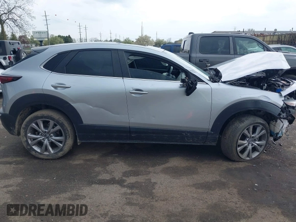 2021 Mazda CX-30 Preferred with VIN 3MVDMBCL6MM240663, listed as a IAAI auction lot 42165803 with 52,262 mi miles and . Bid and sale history available at DreamBid. Image 12.