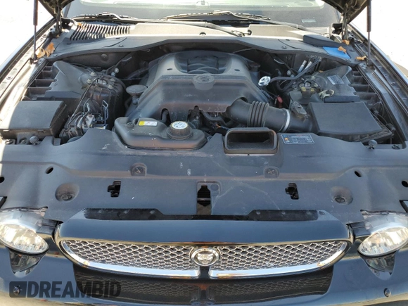 2009 Jaguar XJ 8 with VIN SAJWA71B79SH30431, listed as a Copart auction lot 52403185 with 67,143 mi miles and Salvage Title. Bid and sale history available at DreamBid. Image 11.