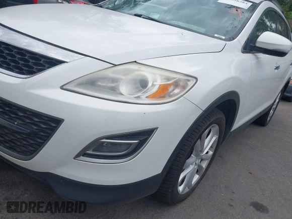 2012 Mazda CX-9 Grand Touring with VIN JM3TB3DA1C0356335, listed as a IAAI auction lot 42658284 with 141,537 mi miles and . Bid and sale history available at DreamBid. Image 6.