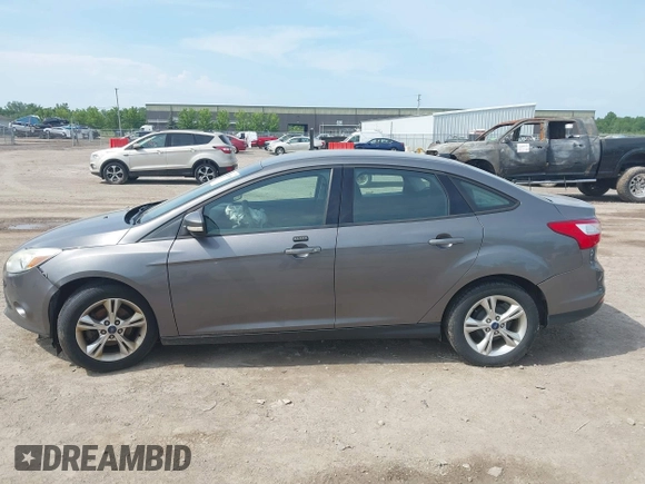 2013 Ford Focus SE with VIN 1FADP3F23DL242475, listed as a IAAI auction lot 42549898 with 155,646 mi miles and . Bid and sale history available at DreamBid. Image 14.