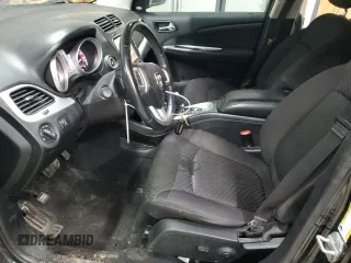 2013 Dodge Journey Crew with VIN 3C4PDCCG4DT693869, listed as a Copart auction lot 63666684 with 134,424 mi miles and Salvage title. Bid and sale history available at DreamBid. Image 7.