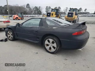 1998 Mitsubishi 3000GT z VIN JA3AM44H8WY000594, wystawiony jako Copart lot #44164155 z przebiegiem 92 227 mil mil oraz Czysty tytuł • Clean title. Historia ofert i sprzedaży dostępna na DreamBid. Obrazek 2.