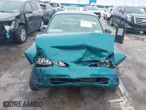 1998 Ford Escort z VIN 3FALP1137WR145199, wystawiony jako IAAI lot #41677279 z przebiegiem 92 232 mil mil oraz . Historia ofert i sprzedaży dostępna na DreamBid. Obrazek 13.