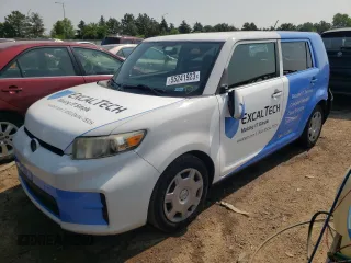 2012 Scion xB with VIN JTLZE4FE8C1143073, listed as a Copart auction lot 63171804 with 144,835 mi miles and Salvage Title. Bid and sale history available at carsss.com. Image 1.
