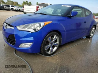 2012 Hyundai Veloster w/Red Int with VIN KMHTC6AD2CU048049, listed as a Copart auction lot 85809854 with 122,914 mi miles and Salvage title. Bid and sale history available at DreamBid. Image 1.