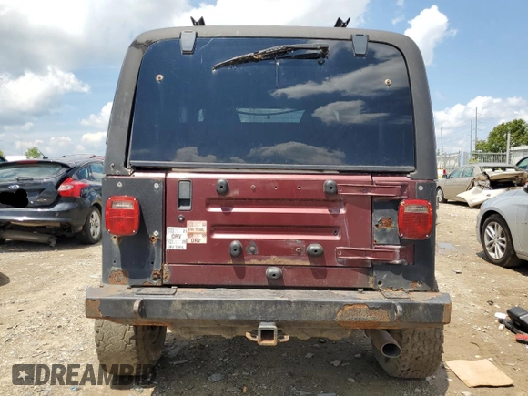 2002 Jeep Wrangler X with VIN 1J4FA39SX2P732881, listed as a Copart auction lot 64451185 with Not provided miles and Clean title. Bid and sale history available at DreamBid. Image 6.