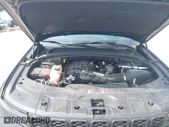 2023 Jeep Grand Cherokee Laredo with VIN 1C4RJHAG2PC660094, listed as a IAAI auction lot 42390290 with 27,802 mi miles and . Bid and sale history available at DreamBid. Image 10.