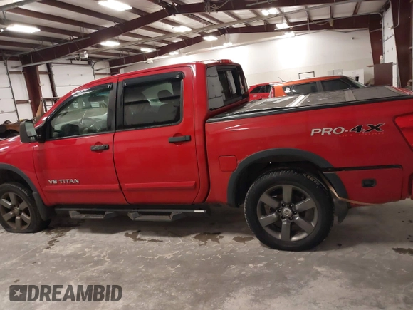 2012 Nissan Titan SV with VIN 1N6AA0EC7CN327973, listed as a IAAI auction lot 41841596 with 148,519 mi miles. Bid and sale history available at carsss.com. Image 14.