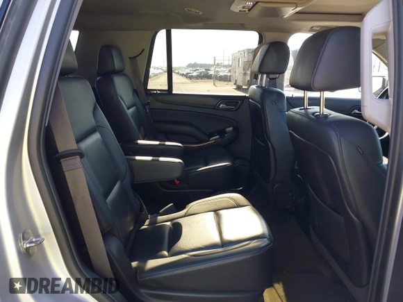 2015 Chevrolet Tahoe LTZ with VIN 1GNSKCKC5FR205739, listed as a IAAI auction lot 40020644 with 142,524 mi miles and . Bid and sale history available at DreamBid. Image 8.