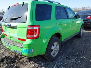 2012 Ford Escape Limited with VIN 1FMCU9E70CKA11998, listed as a IAAI auction lot 41798516 with 999,999 mi miles. Bid and sale history available at carsss.com. Image 4.
