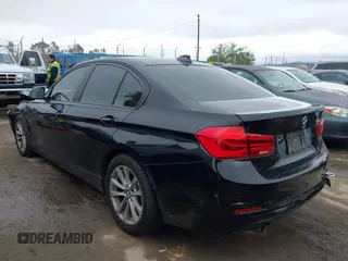 2016 BMW 3 Series 320i with VIN WBA8A9C51GK617012, listed as a IAAI auction lot 41896624 with 56,289 mi miles. Bid and sale history available at carsss.com. Image 3.