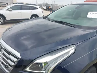 2017 Cadillac XT5 Luxury FWD z VIN 1GYKNBRS9HZ215565, wystawiony jako IAAI lot #42108831 z przebiegiem 78 694 mil mil oraz . Historia ofert i sprzedaży dostępna na DreamBid. Obrazek 6.
