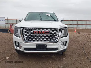 2021 GMC Yukon Denali with VIN 1GKS2DKL0MR178210, listed as a IAAI auction lot 41934532 with 91,785 mi miles. Bid and sale history available at carsss.com. Image 12.