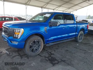 2021 Ford F-150 XL with VIN 1FTFW1CD0MFC50953, listed as a IAAI auction lot 41466036 with 33,983 mi miles and . Bid and sale history available at DreamBid. Image 2.