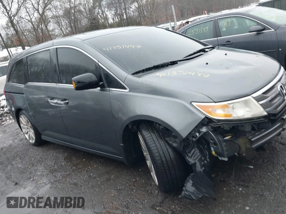 2012 Honda Odyssey Touring with VIN 5FNRL5H98CB089871, listed as a IAAI auction lot 41351447 with 999,999 mi miles. Bid and sale history available at carsss.com. Image 12.
