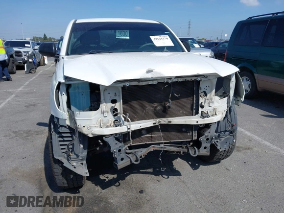 2014 Toyota Tacoma with VIN 5TFNX4CN7EX041191, listed as a IAAI auction lot 42141570 with 227,969 mi miles and . Bid and sale history available at DreamBid. Image 6.