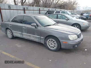 2004 Hyundai XG with VIN KMHFU45E14A355782, listed as a IAAI auction lot 41357500 with 138,236 mi miles. Bid and sale history available at carsss.com. Image 1.