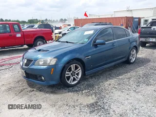 2009 Pontiac G8 with VIN 6G2ER57729L152974, listed as a IAAI auction lot 42083226 with 213,733 mi miles and . Bid and sale history available at DreamBid. Image 2.