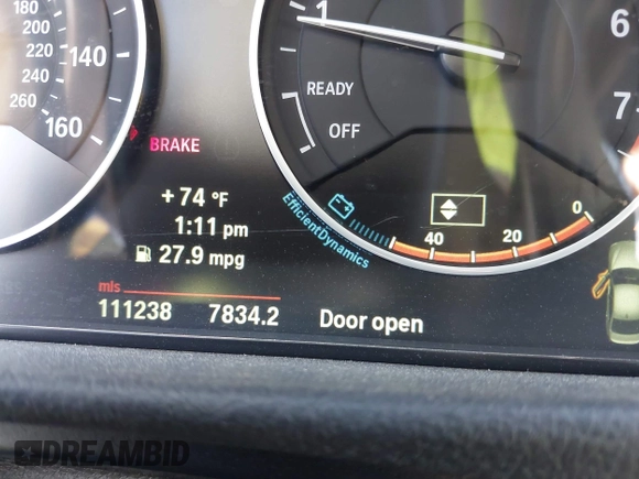 2012 BMW 3 Series 328i with VIN WBA3A5C53CFJ89806, listed as a IAAI auction lot 41703272 with 111,238 mi miles. Bid and sale history available at carsss.com. Image 7.