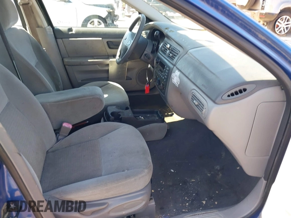 2003 Ford Taurus SE Standard with VIN 1FAFP53U23A251835, listed as a IAAI auction lot 41751323 with 119,660 mi miles. Bid and sale history available at carsss.com. Image 5.
