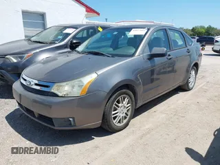 2011 Ford Focus SE with VIN 1FAHP3FN4BW174842, listed as a IAAI auction lot 42027681 with 58,616 mi miles. Bid and sale history available at carsss.com. Image 2.