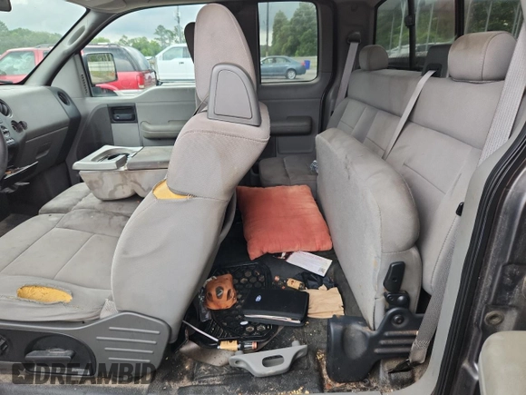 2005 Ford F-150 STX with VIN 1FTRX12W55FB32573, listed as a Copart auction lot 59602715 with 238,701 mi miles and Salvage title. Bid and sale history available at DreamBid. Image 10.