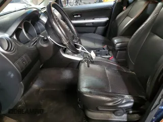 2012 Suzuki Grand Vitara Limited z VIN JS3TD0D77C4101382, wystawiony jako Copart lot #60017895 z przebiegiem 118 024 mil mil oraz Szkoda całkowita • Salvage title. Historia ofert i sprzedaży dostępna na DreamBid. Obrazek 7.