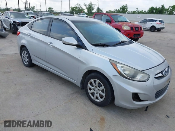 2012 Hyundai Accent GLS with VIN KMHCT4AE7CU252553, listed as a IAAI auction lot 42100914 with 232,705 mi miles. Bid and sale history available at carsss.com. Image 1.